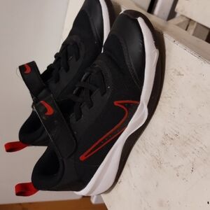 Kids Black and Red Nike Shoes